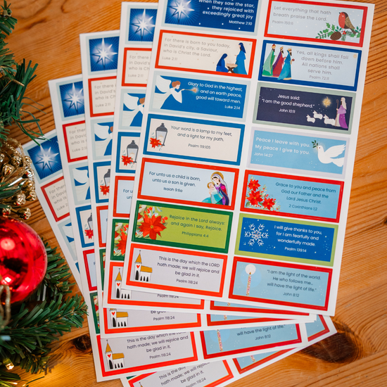 Sheets of Christmas Bible verse stickers with festive imagery