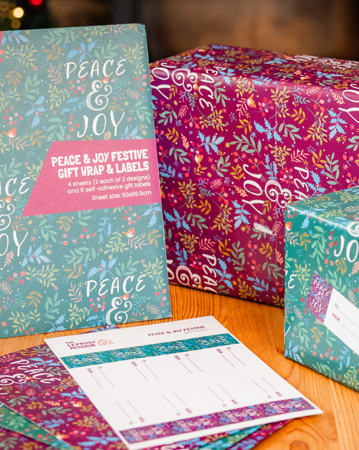 Peace and Joy festive gift wrap sheets with coordinating gift tags