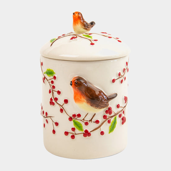 Ceramic robin and berries biscuit jar containing shortbread biscuits