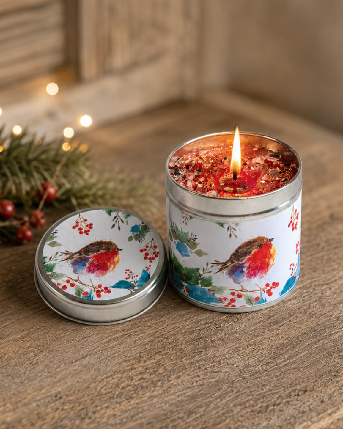 Robin design candle tin with mulled cranberry and orange fragrance