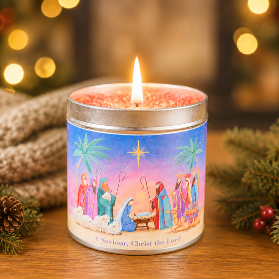 A Saviour nativity design candle tin with gold, frankincense and myrrh scent