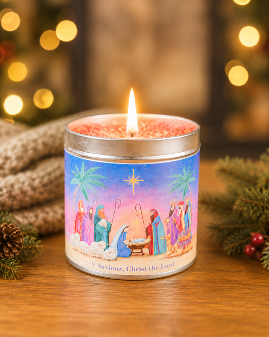A Saviour nativity design candle tin with gold, frankincense and myrrh scent