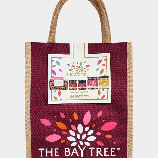 Sweet treats gift shopper with Genoa cake, marmalade and preserves