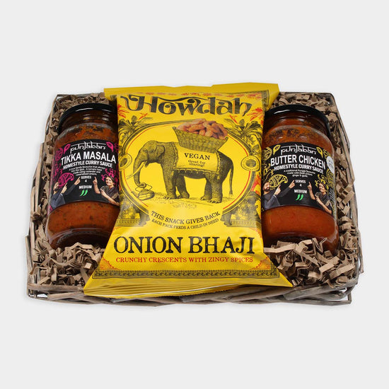 Curry night hamper with curry sauces and onion bhaji snacks